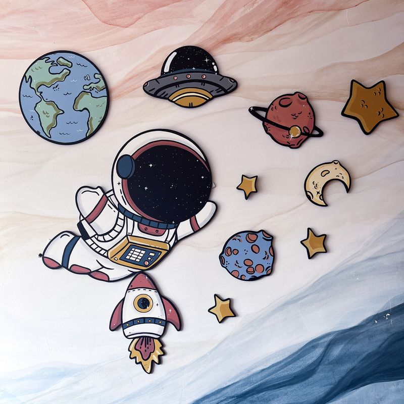 Mural Astronautas en aplique